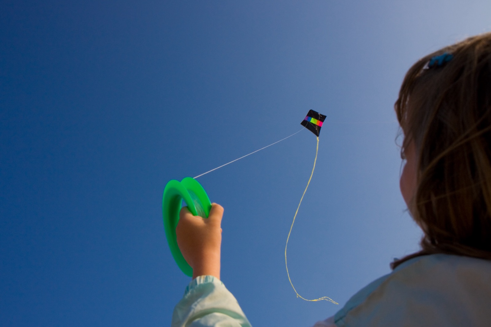 Kid flying a kite